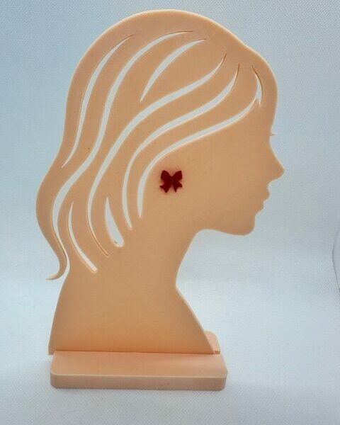 Boucles d’oreilles clous “Nœud papillon”